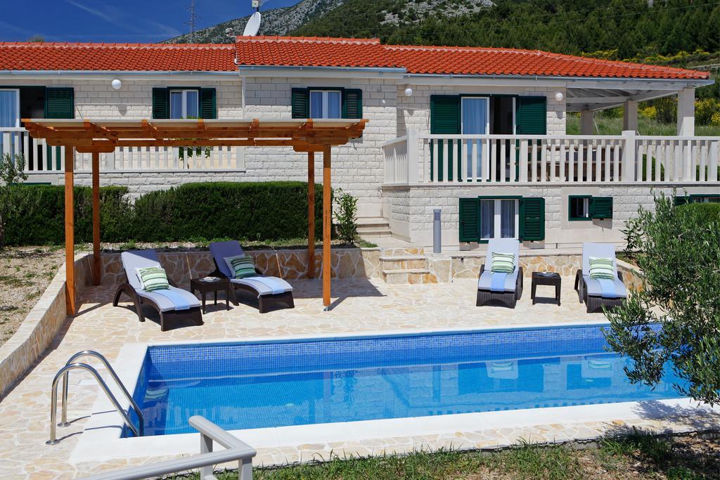 Holiday Homes Oliva Bol Pokoj fotografie