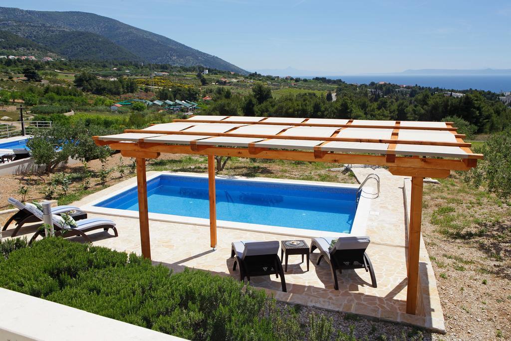 Holiday Homes Oliva Bol Pokoj fotografie